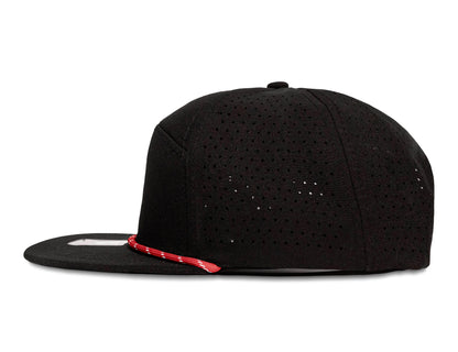 Black perforated snapback hat with red accent, perfect for customization and personal style.